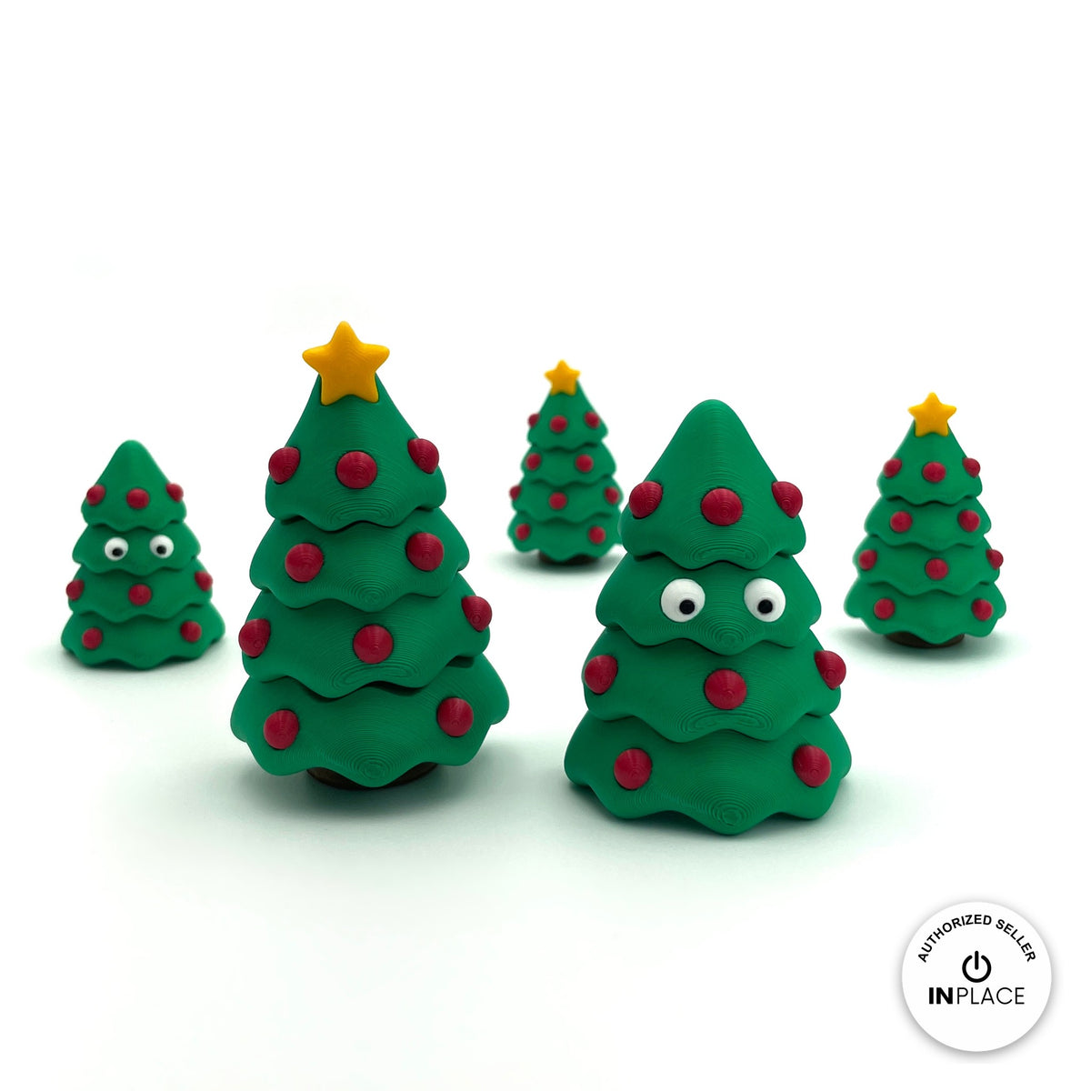 Cute Christmas tree keychain, 3D printed by RU3D – group of Christmas trees. Green with red baubles and yellow star.