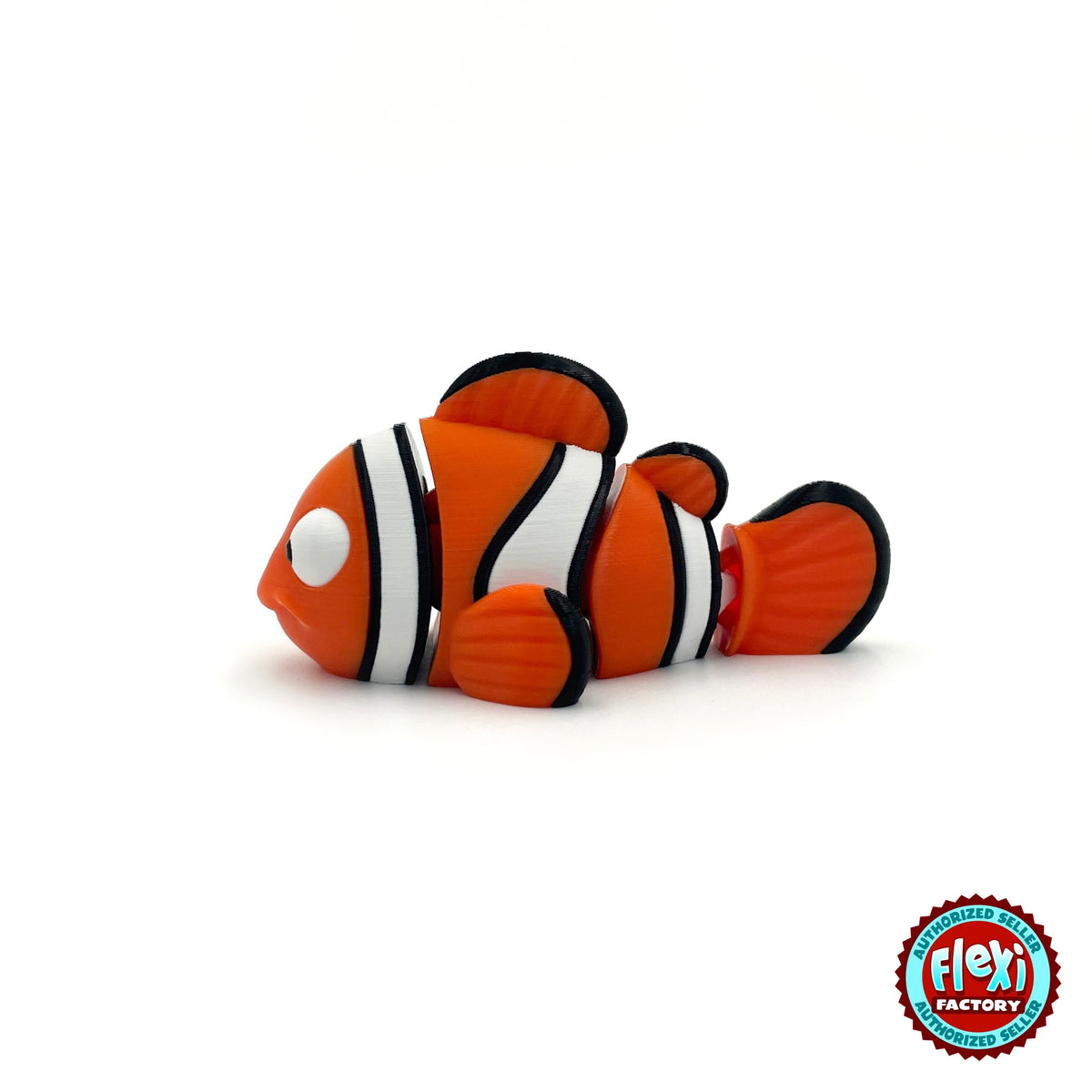 Cute clownfish keychain, 3D printed by RU3D – side view facing left. Orange with white and black stripes.