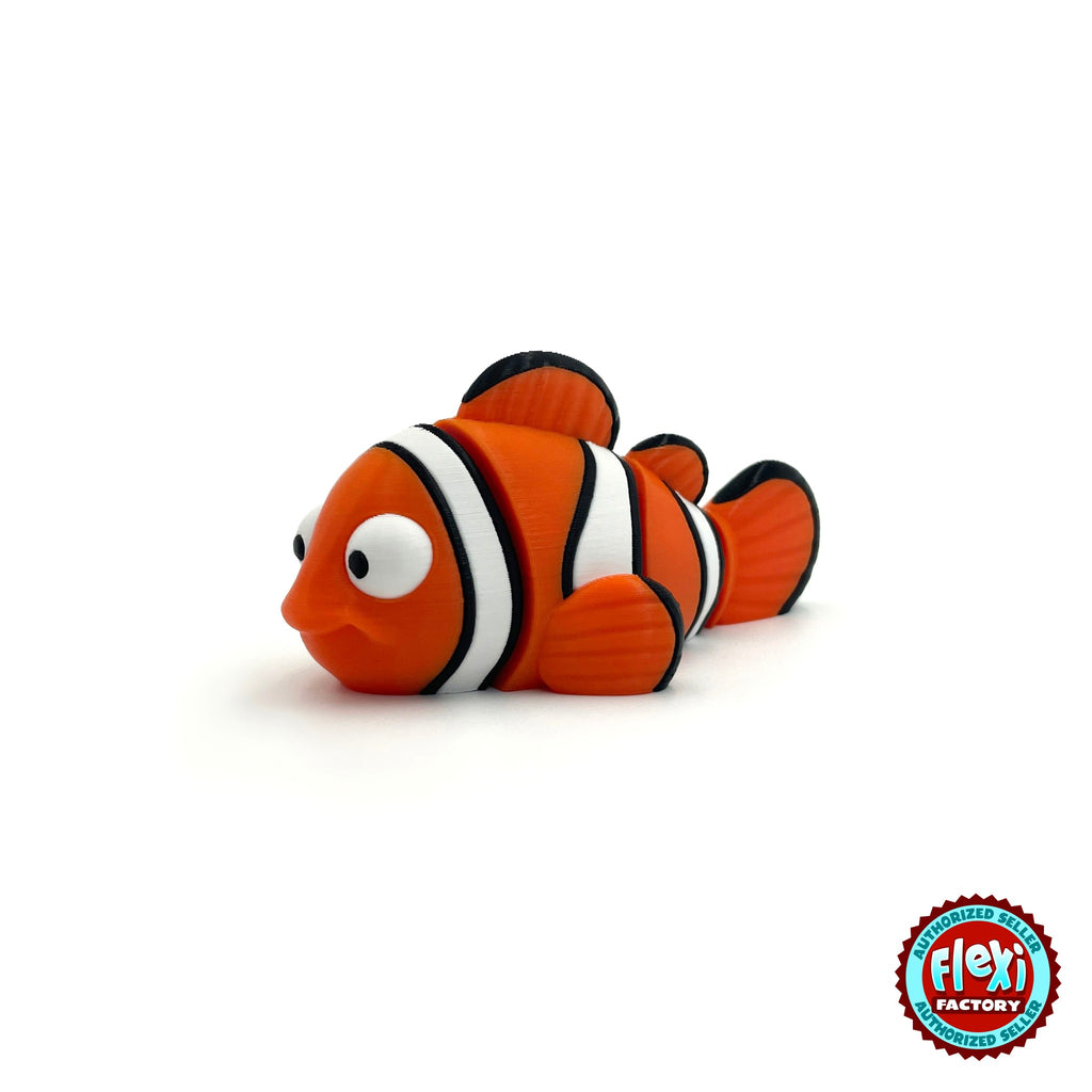 Cute clownfish keychain, 3D printed by RU3D – three quarter view facing left. Orange with white and black stripes.