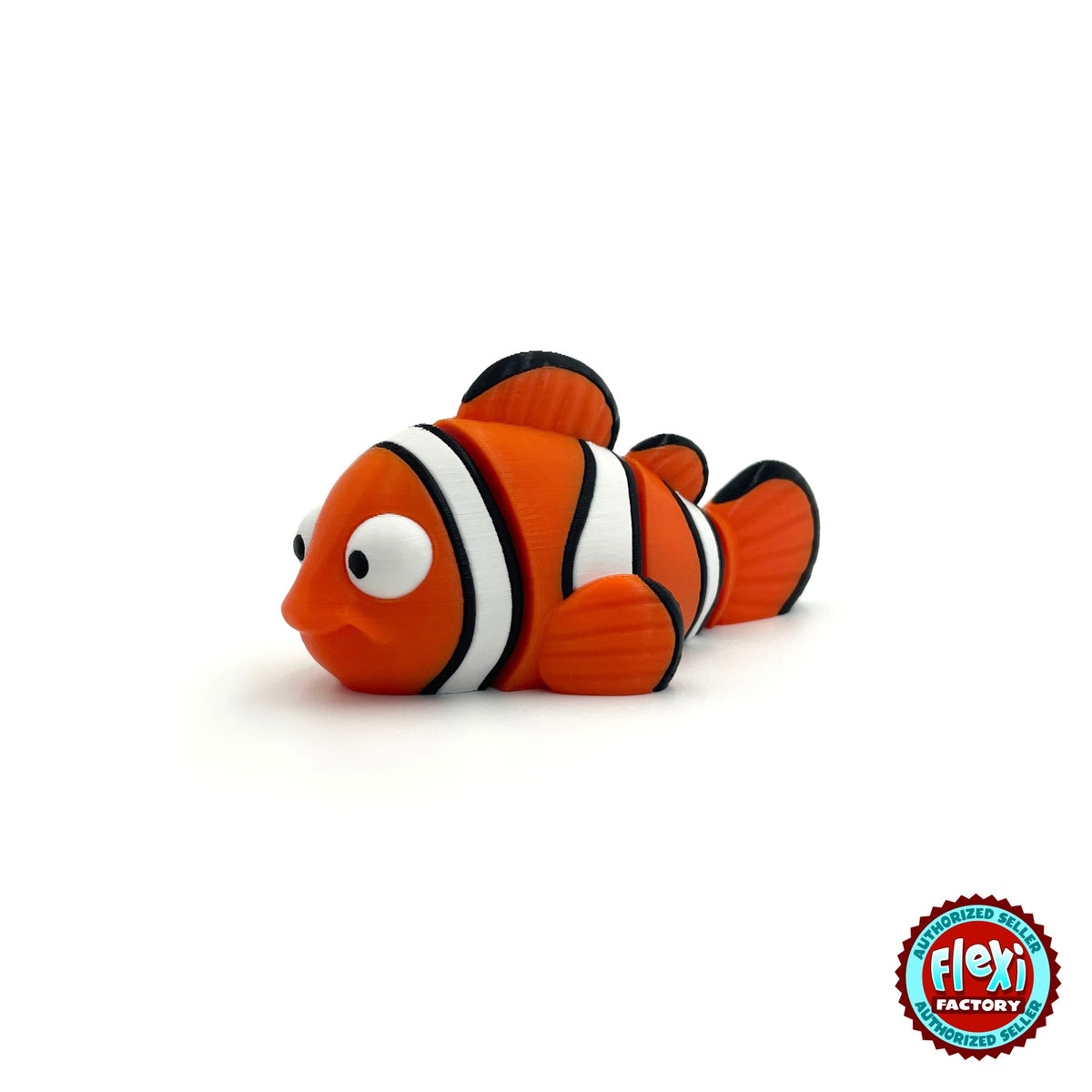 Cute clownfish keychain, 3D printed by RU3D – three quarter view facing left. Orange with white and black stripes.