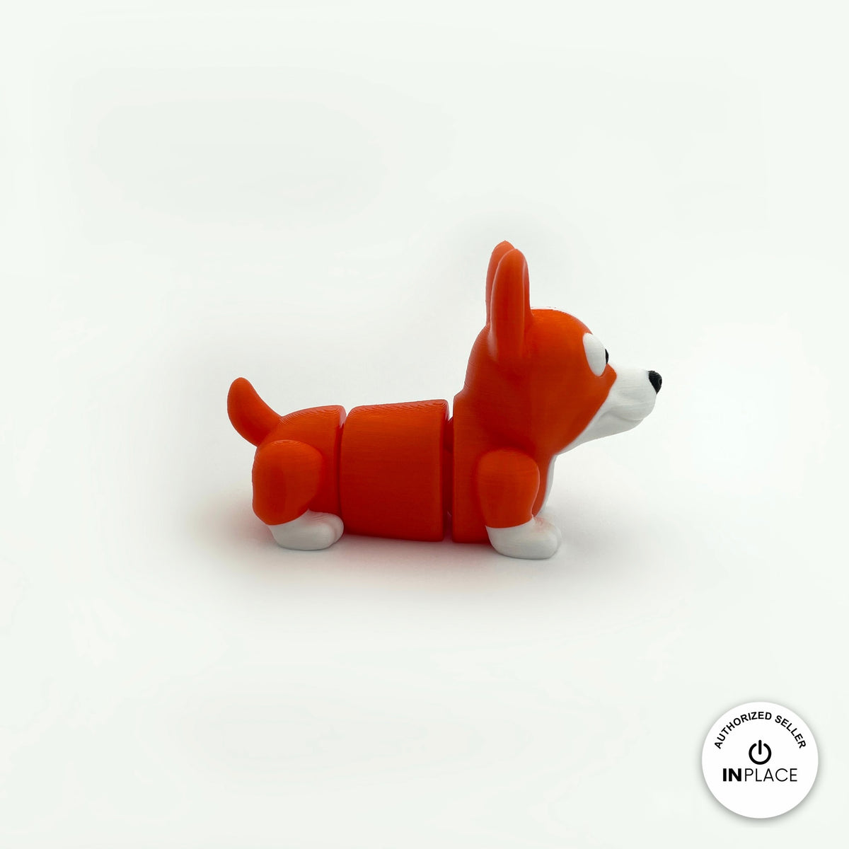Cute corgi keychain, 3D printed by RU3D – side view facing right. Orange and white.
