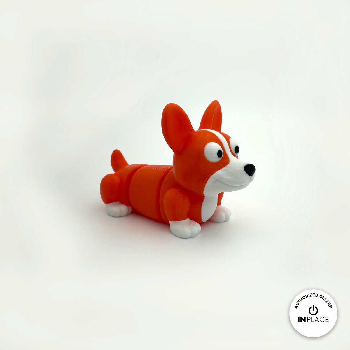 Cute corgi keychain, 3D printed by RU3D – three quarter view facing right. Orange and white.