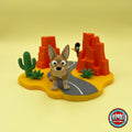 Cute coyote keychain, 3D printed by RU3D – front view with desert highway playset. Tan brown with desert highway playset.