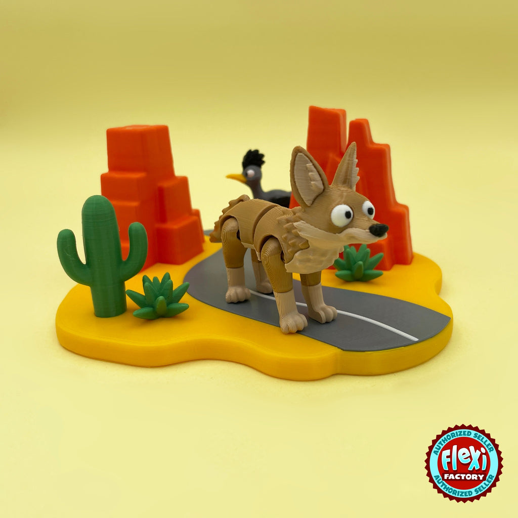 Cute coyote keychain, 3D printed by RU3D – three quarter view with cactus and rocks. Tan brown with desert highway playset.