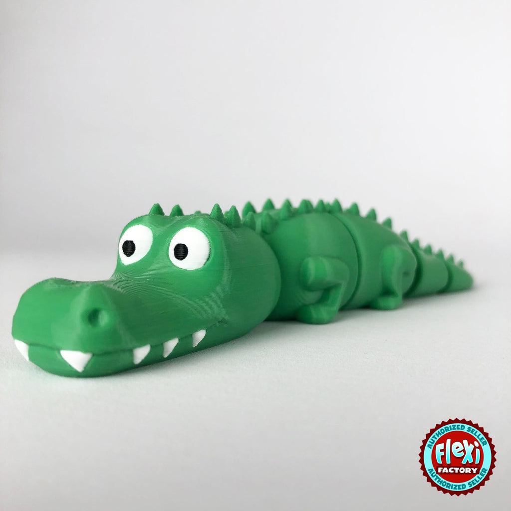 Cute crocodile keychain, 3D printed by RU3D – front three quarter view facing left. Green with white teeth.