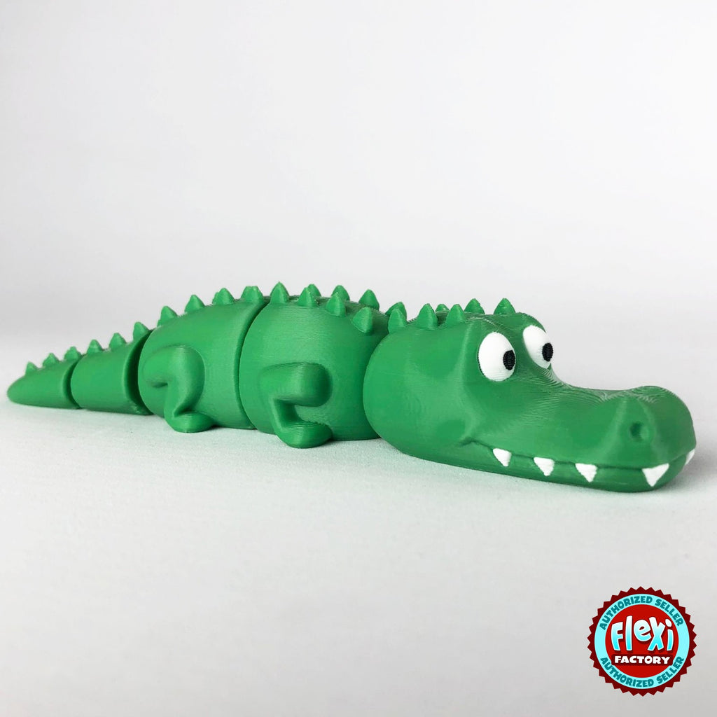Cute crocodile keychain, 3D printed by RU3D – side view facing right. Green with white teeth.