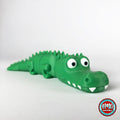 Cute crocodile keychain, 3D printed by RU3D – three quarter view facing right. Green with white teeth.