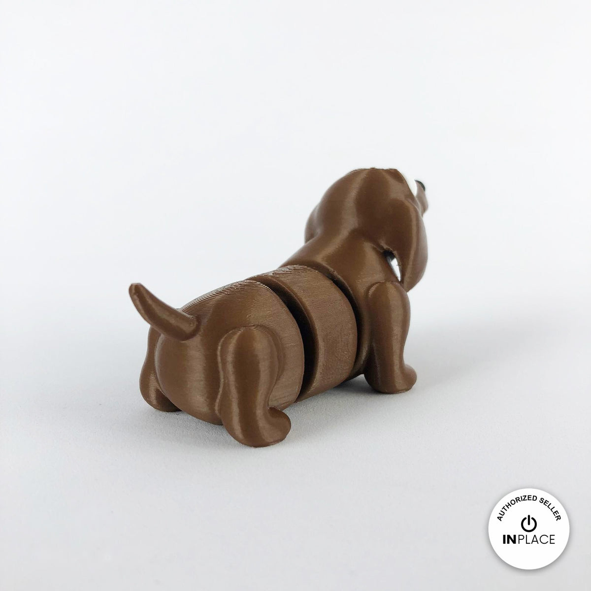 Cute dachshund sausage dog keychain, 3D printed by RU3D – rear three quarter view. Brown.