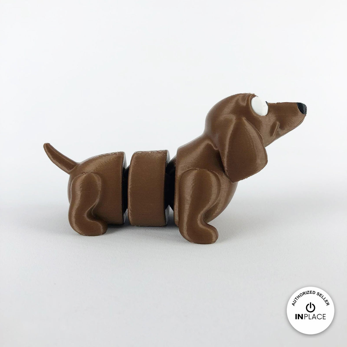 Cute dachshund sausage dog keychain, 3D printed by RU3D – side view facing right. Brown.