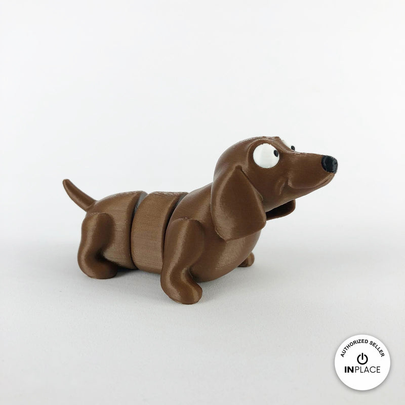 Cute dachshund sausage dog keychain, 3D printed by RU3D – three quarter view facing right. Brown.
