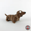 Cute dachshund sausage dog keychain, 3D printed by RU3D – three quarter view facing right. Brown.