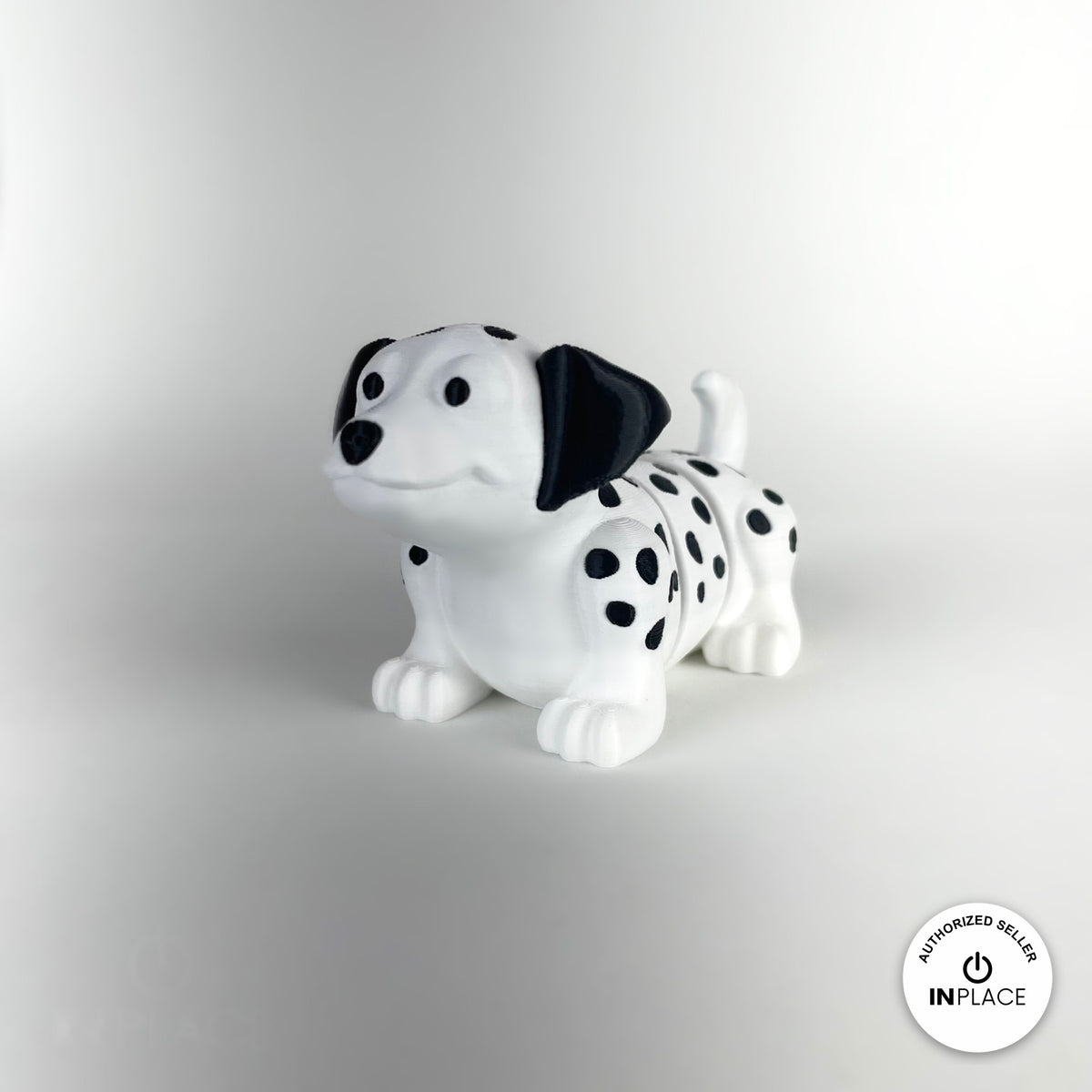 Cute Dalmatian keychain, 3D printed by RU3D – three quarter view facing left. White with black spots.
