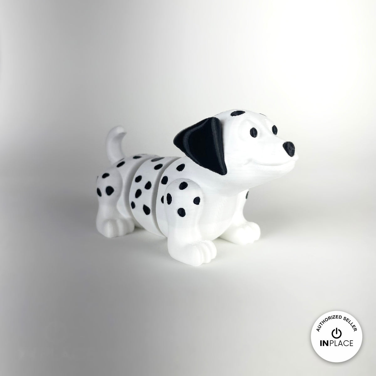 Cute Dalmatian keychain, 3D printed by RU3D – three quarter view facing right. White with black spots.
