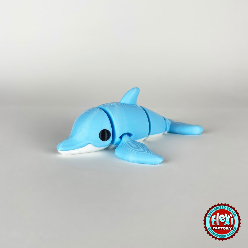 Cute dolphin keychain, 3D printed by RU3D – side view facing left. Sky blue with white belly.