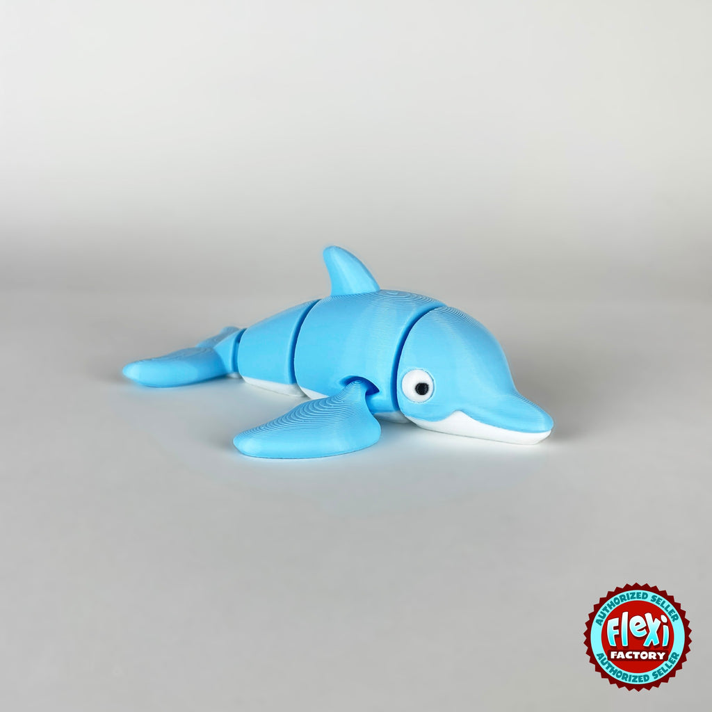 Cute dolphin keychain, 3D printed by RU3D – side view facing right. Sky blue with white belly.