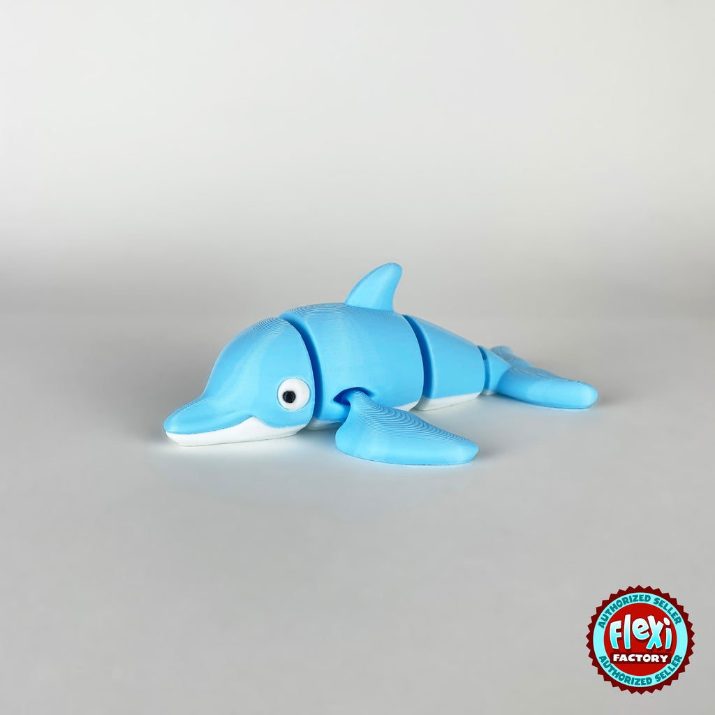 Cute dolphin keychain, 3D printed by RU3D – three quarter view facing left. Sky blue with white belly.