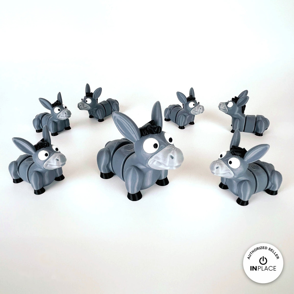 Cute donkey keychain, 3D printed by RU3D – group of donkeys. Grey with black mane and hooves.