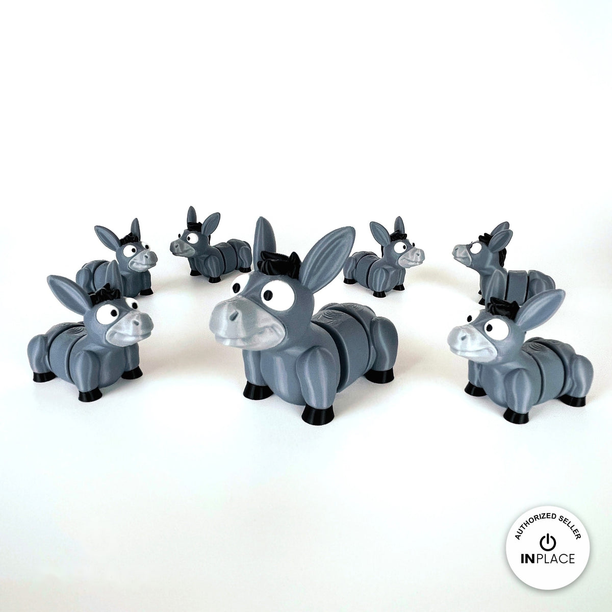 Cute donkey keychain, 3D printed by RU3D – herd of donkeys. Grey with black mane and hooves.