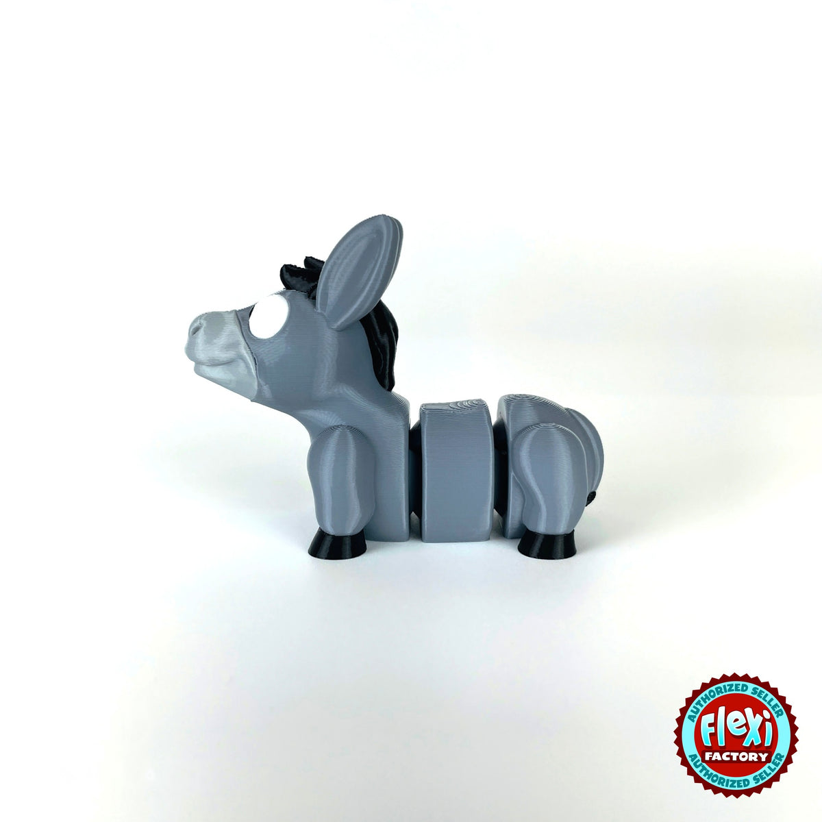 Cute donkey keychain, 3D printed by RU3D – side view facing left. Grey with black mane and hooves.