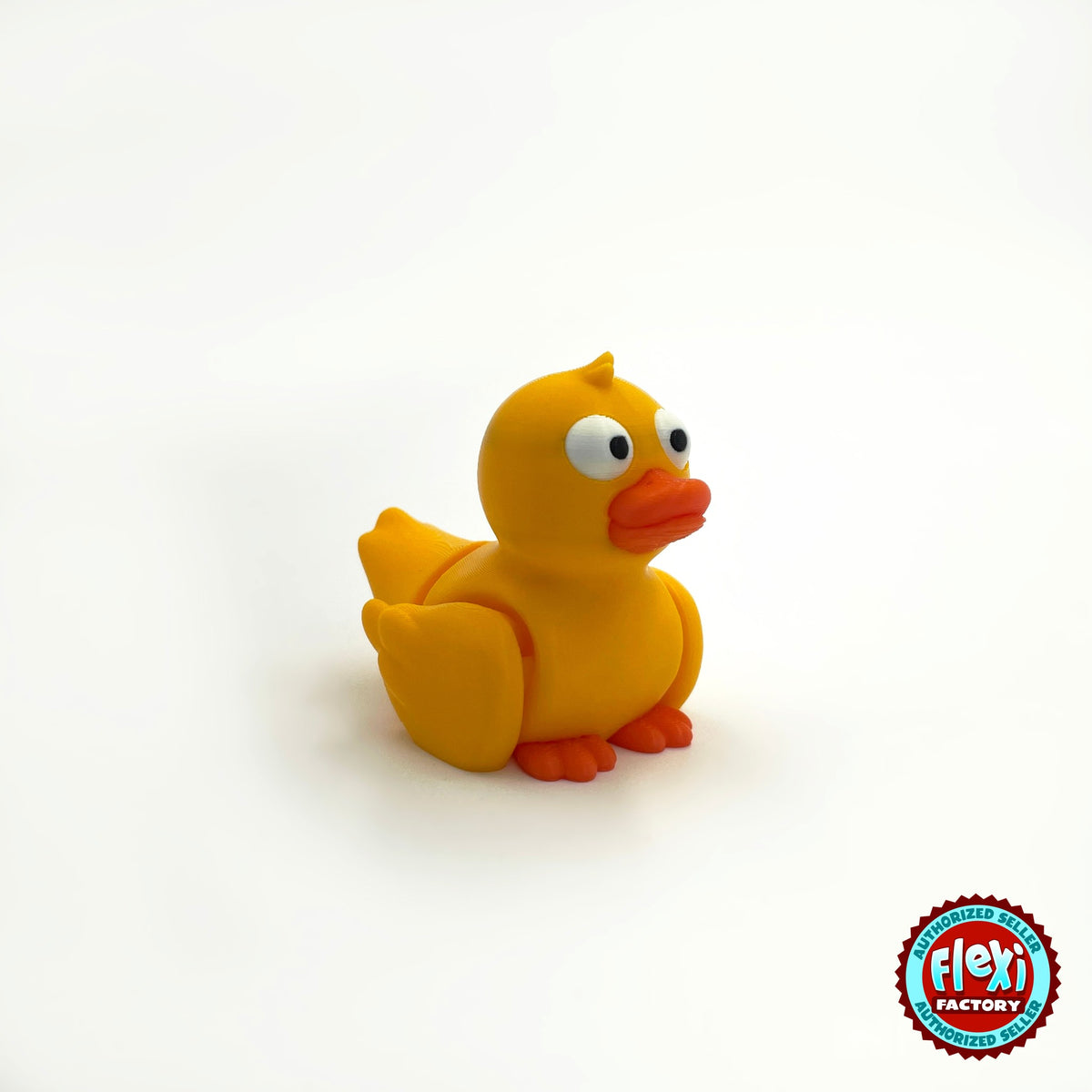 Cute duck keychain, 3D printed by RU3D – yellow duck three quarter view facing right. Yellow with orange beak, also in white.