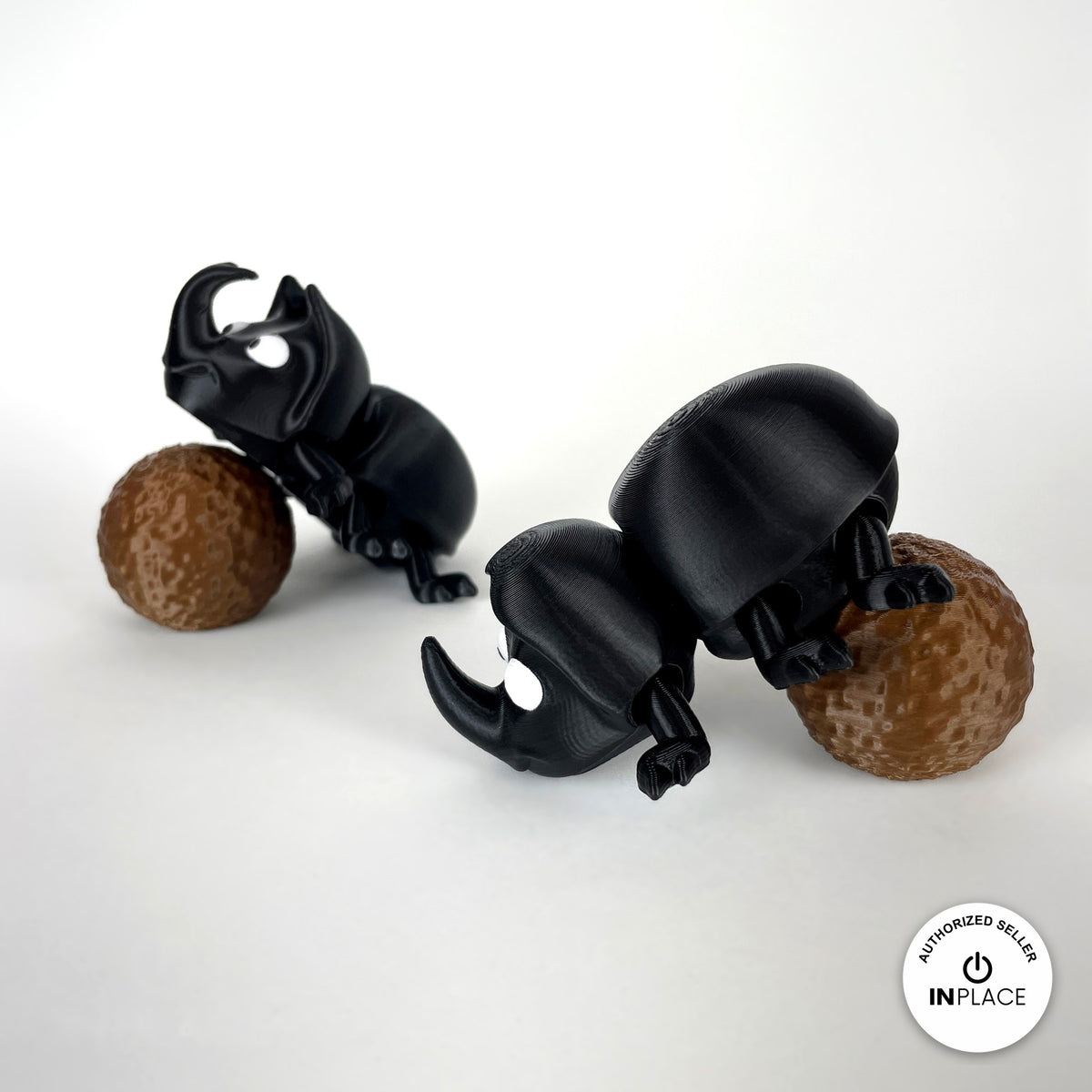 3D printed dung ball accessory by RU3D, shown with the Dung Beetle keychain