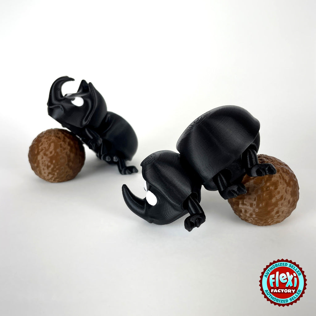 Cute dung beetle keychain, 3D printed by RU3D – pair pushing dung balls. Black rhino beetle with brown dung ball.