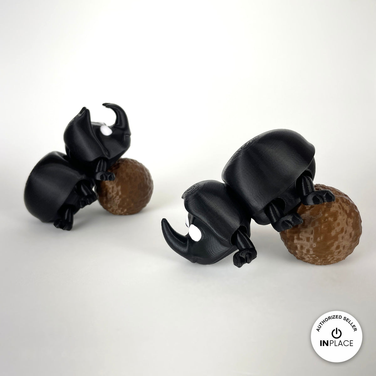 3D printed dung ball accessory by RU3D, shown with the Dung Beetle keychain