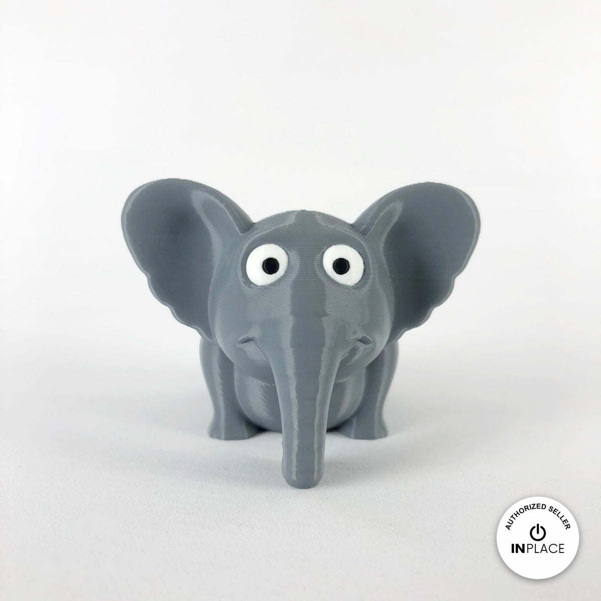 Cute elephant keychain, 3D printed by RU3D – front view ears out. Grey.