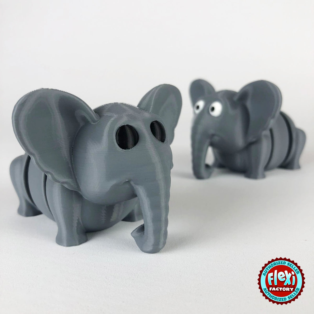 Cute elephant keychain, 3D printed by RU3D – pair of elephants. Grey.