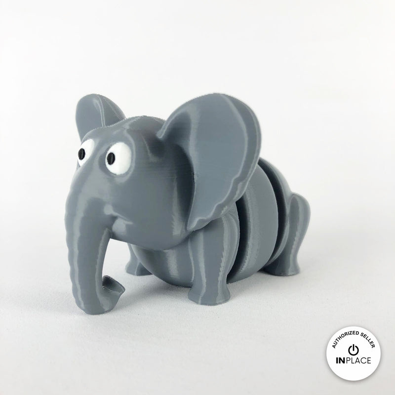 Cute elephant keychain, 3D printed by RU3D – three quarter view facing left. Grey.