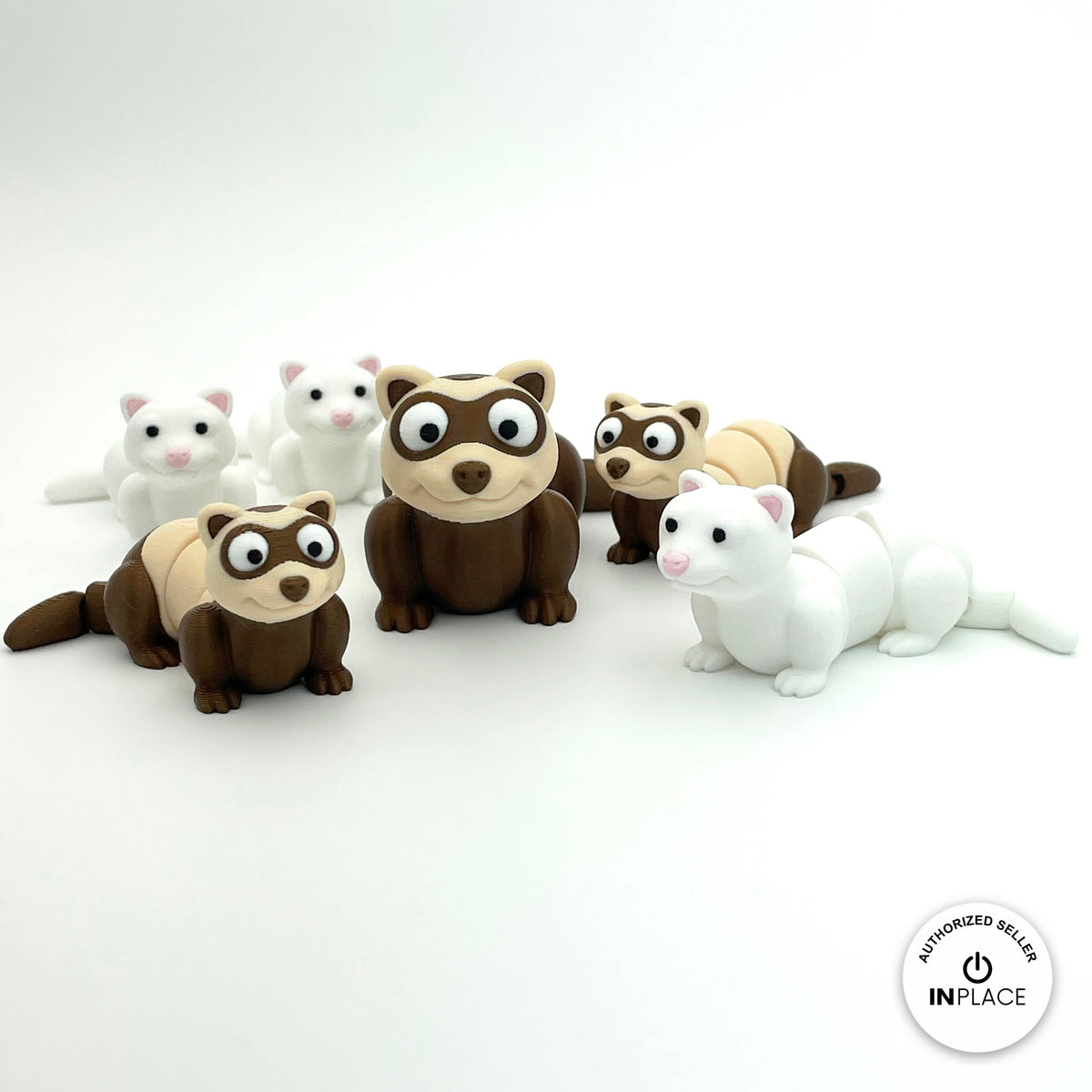 Cute ferret keychain, 3D printed by RU3D – group of ferrets front view. Brown and cream, also in white.