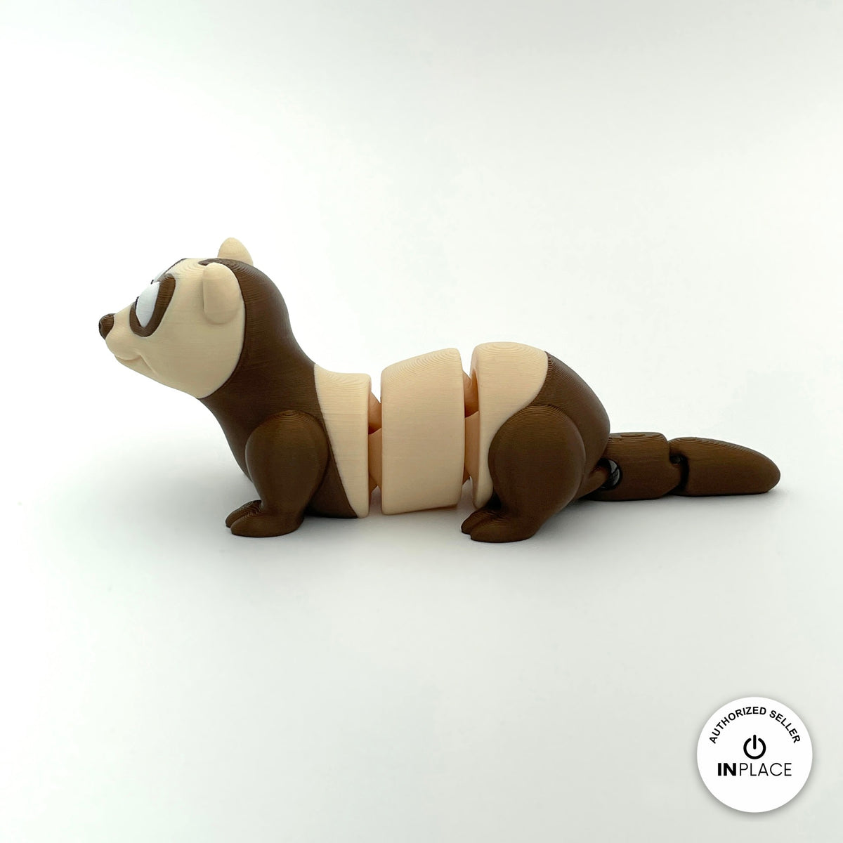 Cute ferret keychain, 3D printed by RU3D – side view facing left. Brown and cream, also in white.