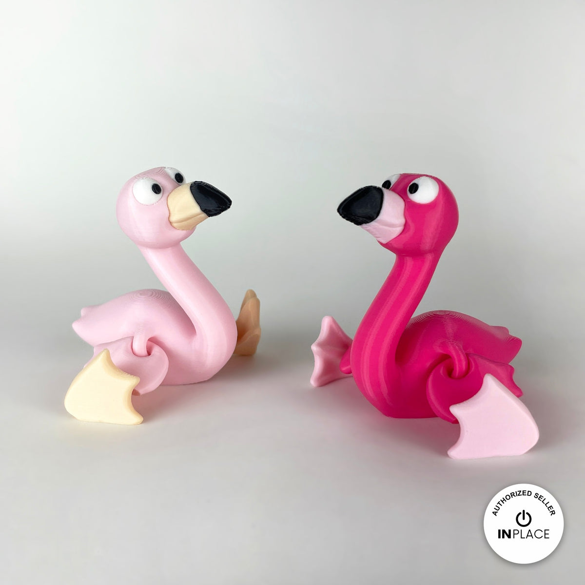Cute flamingo keychain, 3D printed by RU3D – pair of flamingos sitting. Hot pink, also in light pink.