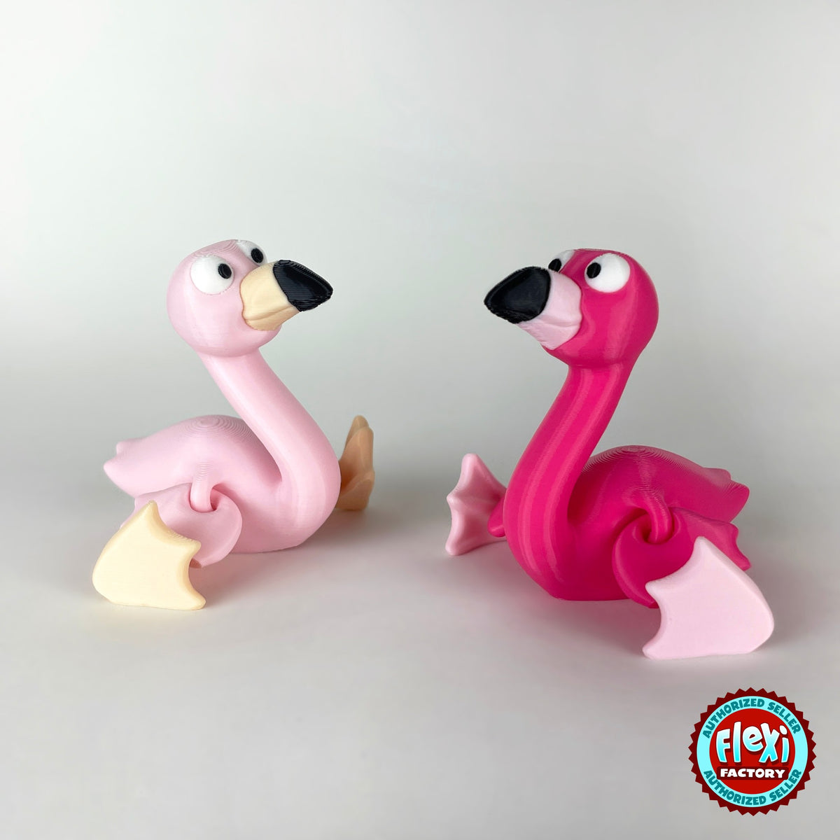Cute flamingo keychain, 3D printed by RU3D – pair of flamingos sitting. Hot pink, also in light pink.