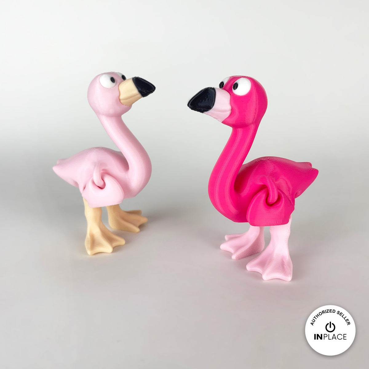 Cute flamingo keychain, 3D printed by RU3D – pink and light pink flamingos. Hot pink, also in light pink.
