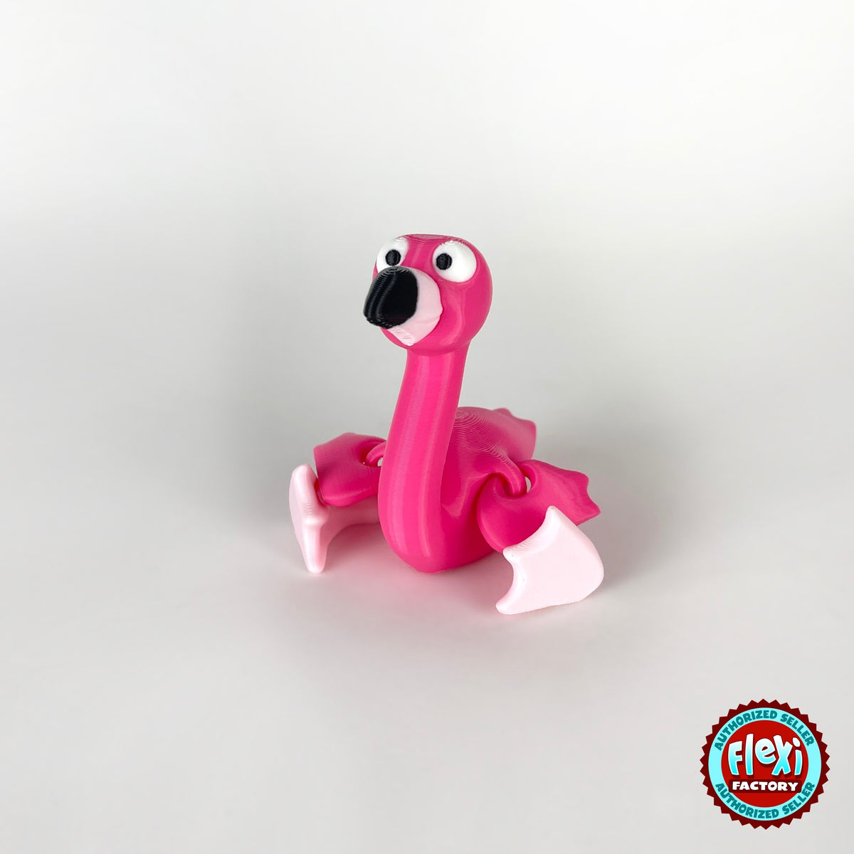 Cute flamingo keychain, 3D printed by RU3D – sitting front view. Hot pink, also in light pink.