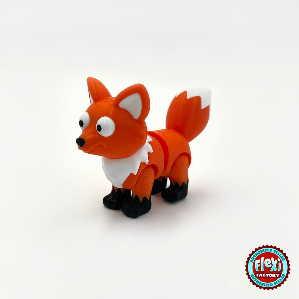 Cute fox keychain, 3D printed by RU3D – three quarter view facing left. Orange with white chest and tail tip.