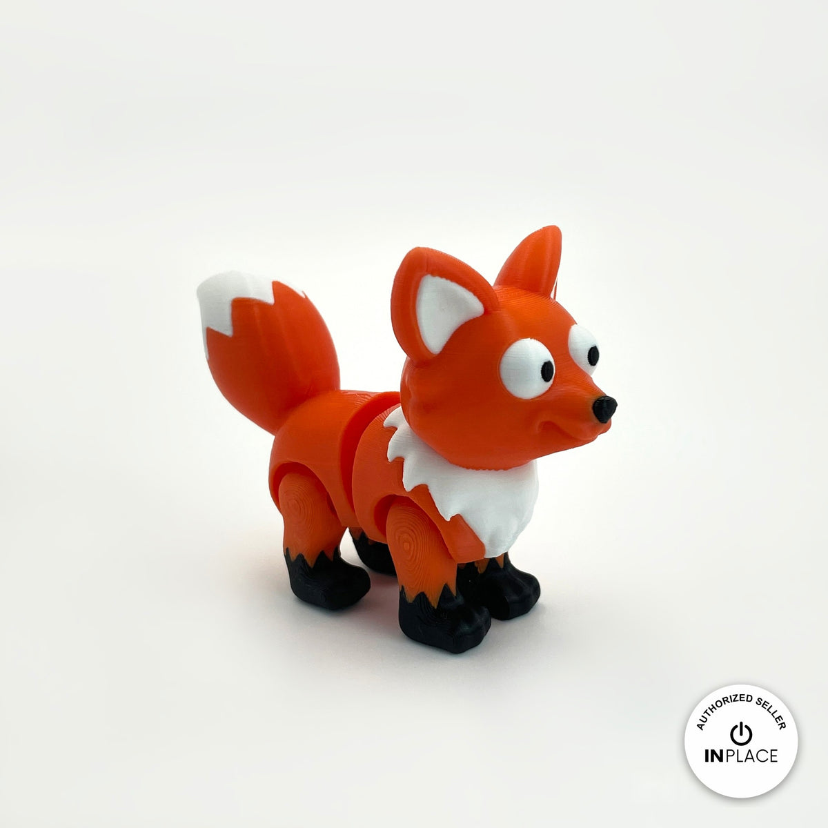 Cute fox keychain, 3D printed by RU3D – three quarter view facing right. Orange with white chest and tail tip.