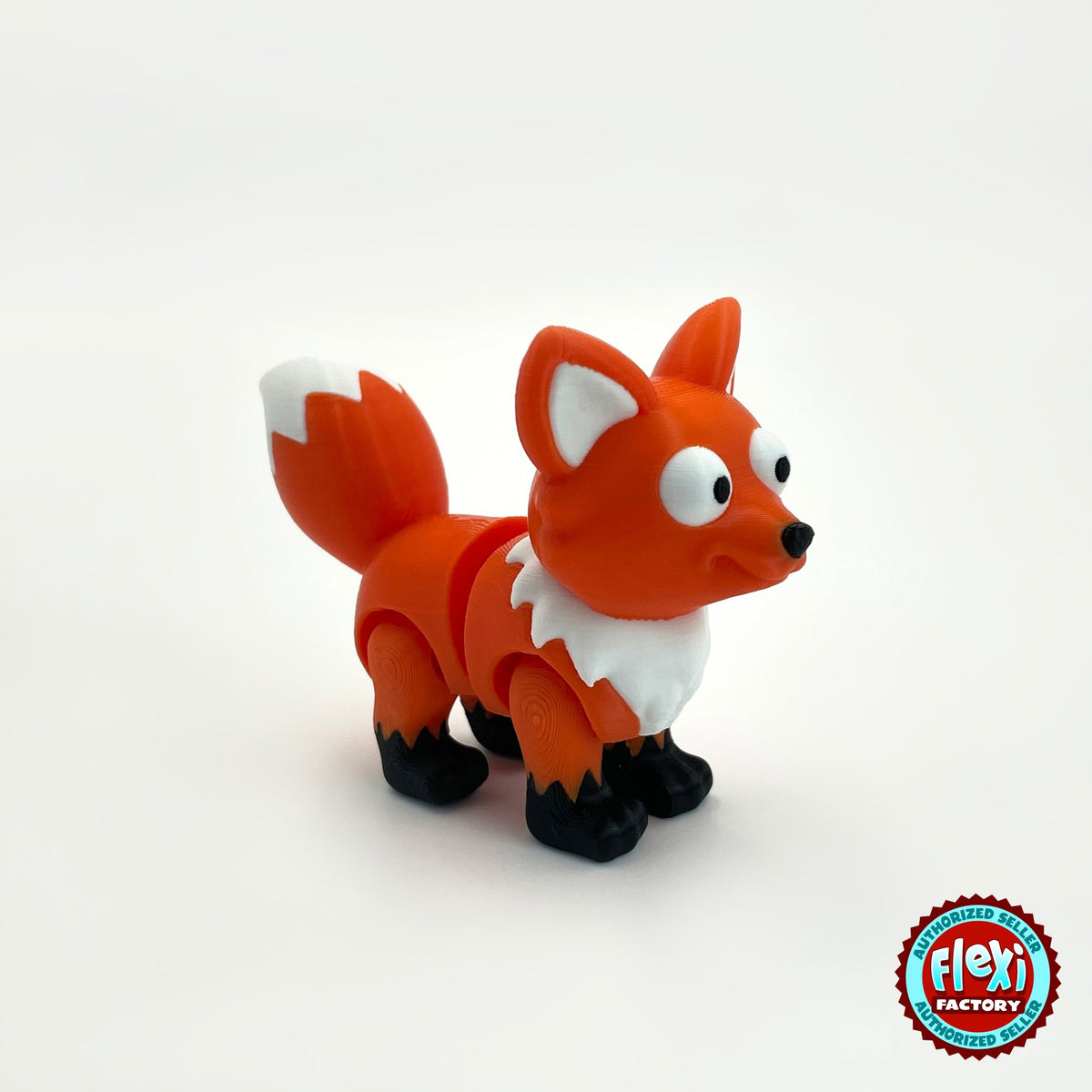 Cute fox keychain, 3D printed by RU3D – three quarter view facing right. Orange with white chest and tail tip.