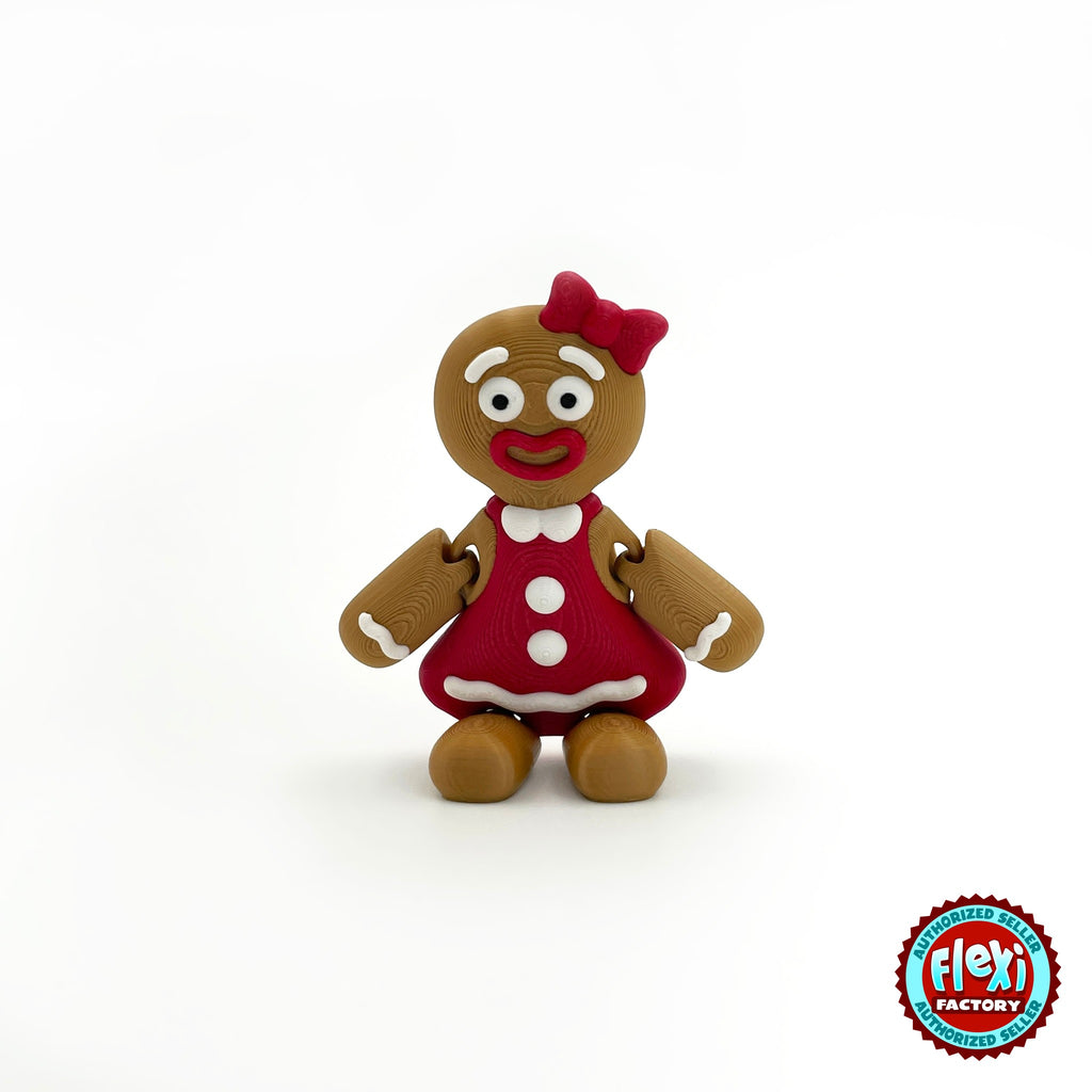 Cute gingerbread woman keychain, 3D printed by RU3D – front view. Brown with red dress and bow.