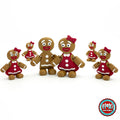Cute gingerbread woman keychain, 3D printed by RU3D – group with gingerbread man. Brown with red dress and bow.