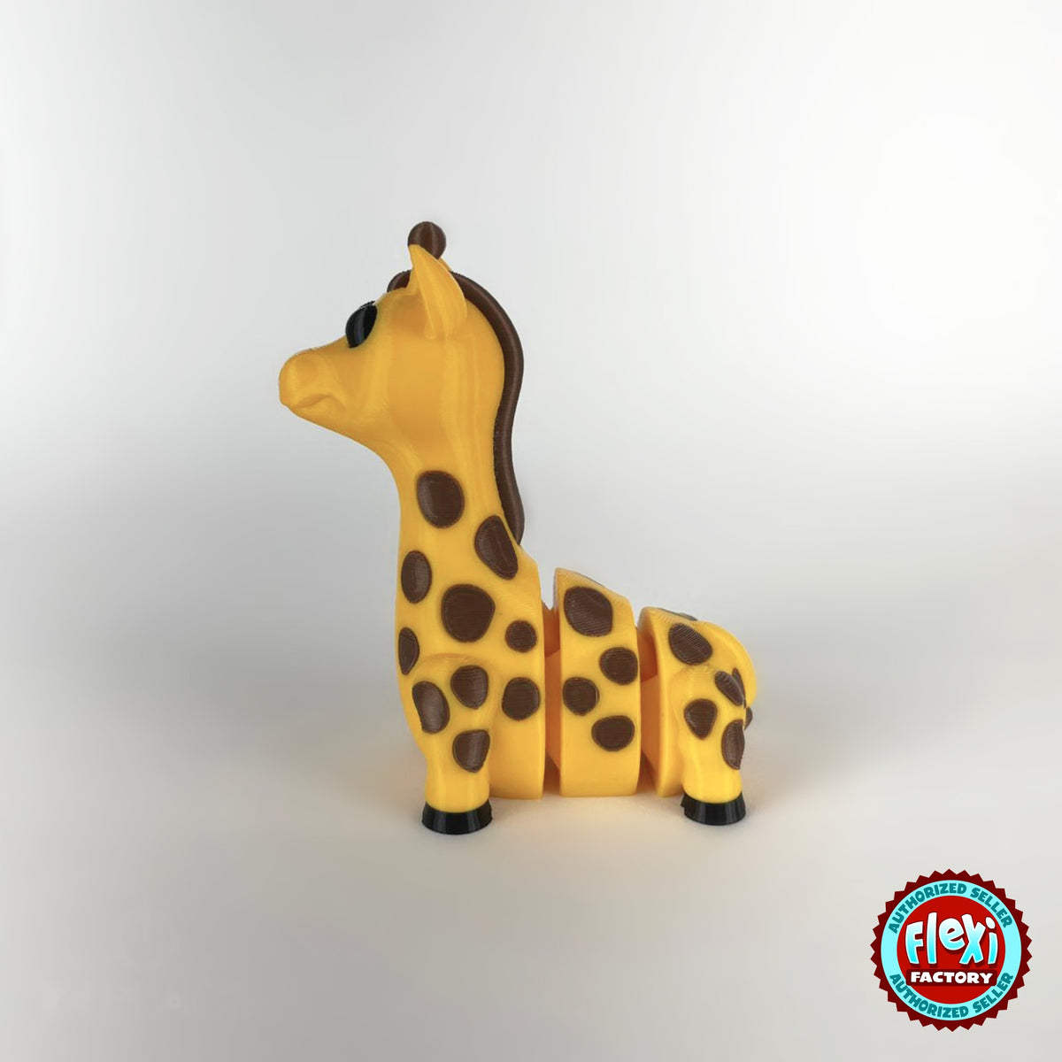 Cute giraffe keychain, 3D printed by RU3D – dark eyes side view facing left. Yellow with brown spots.