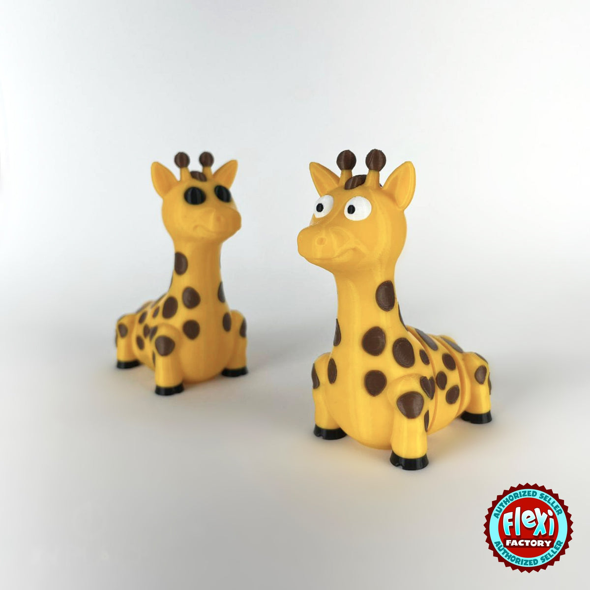 Cute giraffe keychain, 3D printed by RU3D – pair of giraffes. Yellow with brown spots.