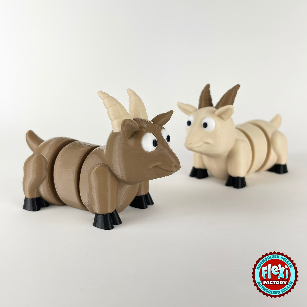 Cute goat keychain, 3D printed by RU3D – brown and cream goats facing right. Brown, cream and white with black hooves.