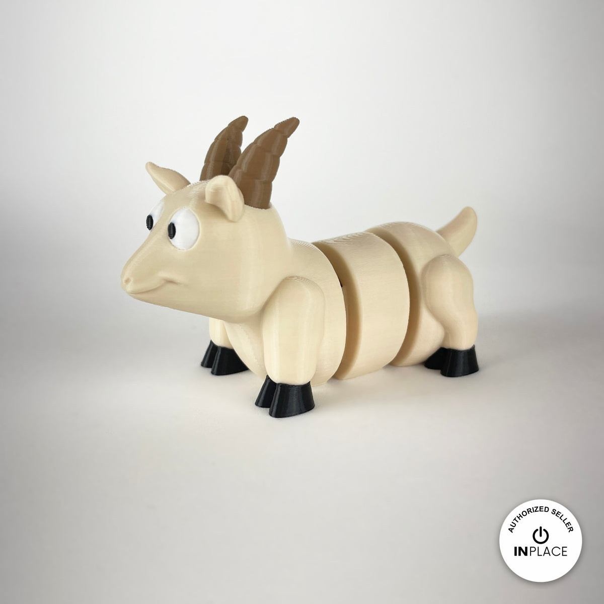 Cute goat keychain, 3D printed by RU3D – cream goat three quarter view facing left. Brown, cream and white with black hooves.