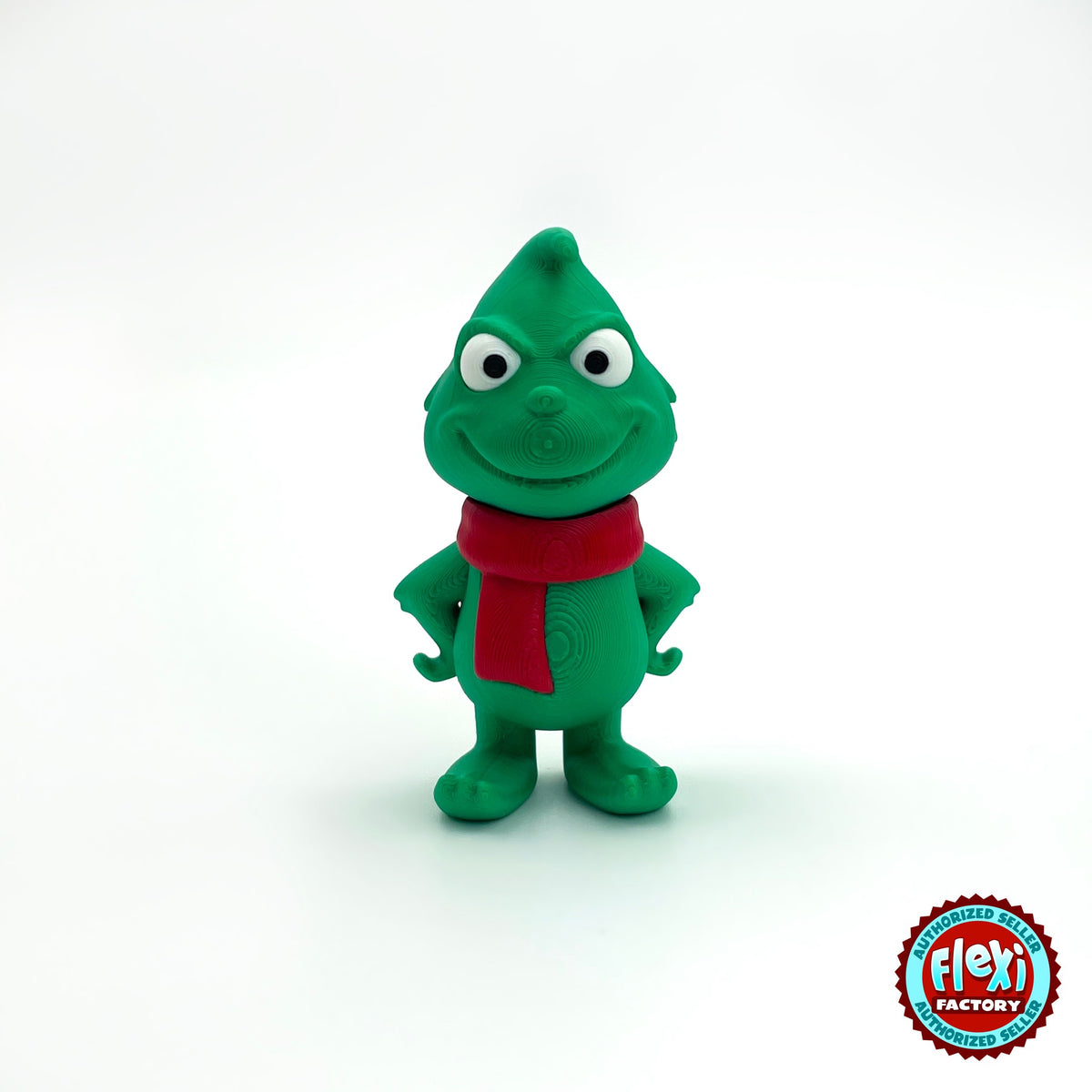 Cute green Christmas grump keychain, 3D printed by RU3D – front view. Green with red scarf and Santa hat.