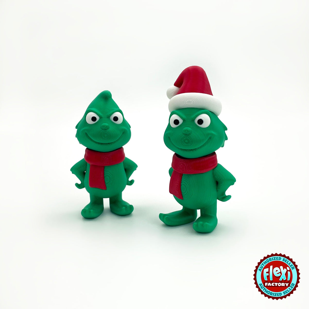 Cute green Christmas grump keychain, 3D printed by RU3D – pair with and without Santa hat. Green with red scarf and Santa hat.