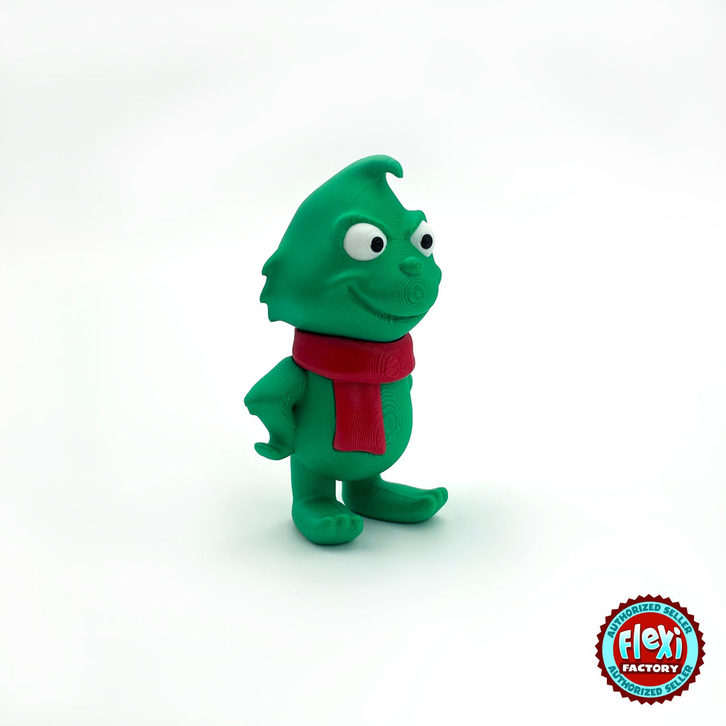 Cute green Christmas grump keychain, 3D printed by RU3D – three quarter view facing right. Green with red scarf and Santa hat.