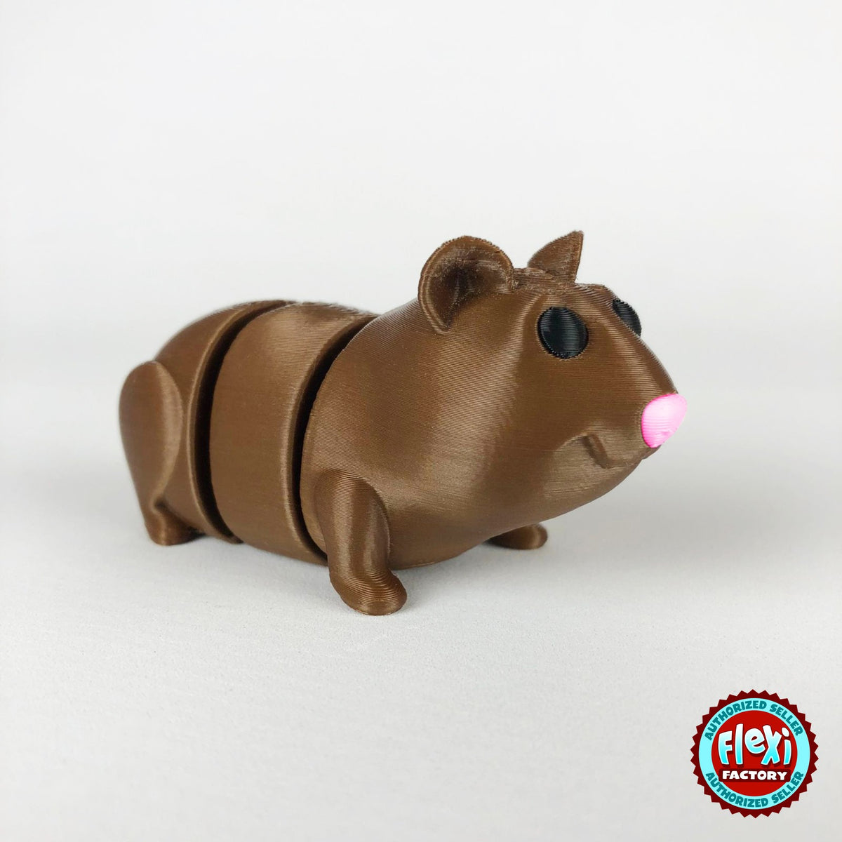 Cute guinea pig keychain, 3D printed by RU3D – dark eyes three quarter view facing right. Brown with pink nose, also brown and white.