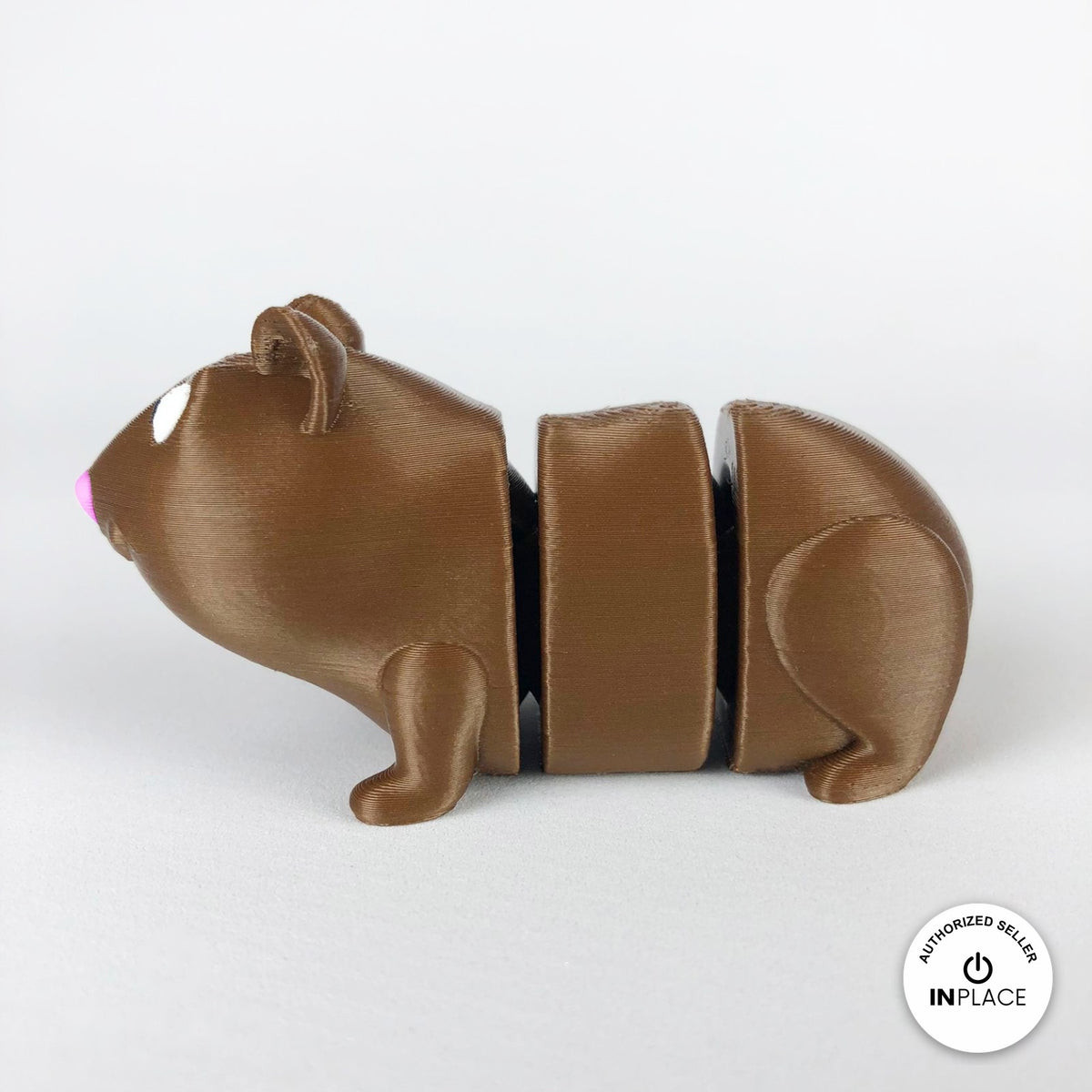 Cute guinea pig keychain, 3D printed by RU3D – side view facing left. Brown with pink nose, also brown and white.